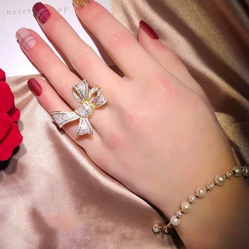 Мода жените кубичен цирконий инкрустирани лук пръст пръстен Сватба парти бижута подарък luxus катерина шмюк extensible defensa personal