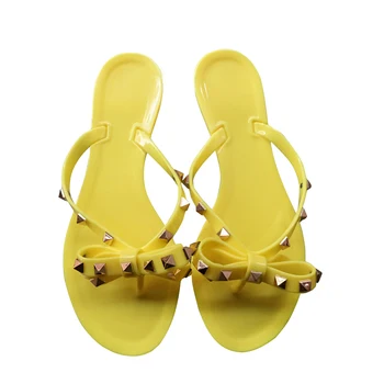 Нит лък сандали годишна жена плажни джапанки желе обувки PVC пързалки момичета сандали приплъзване на равна подметка с жени шипове чехли